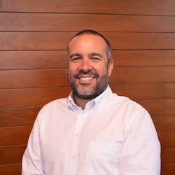 Staff member Christian Alvarado from ID_b5f0b9