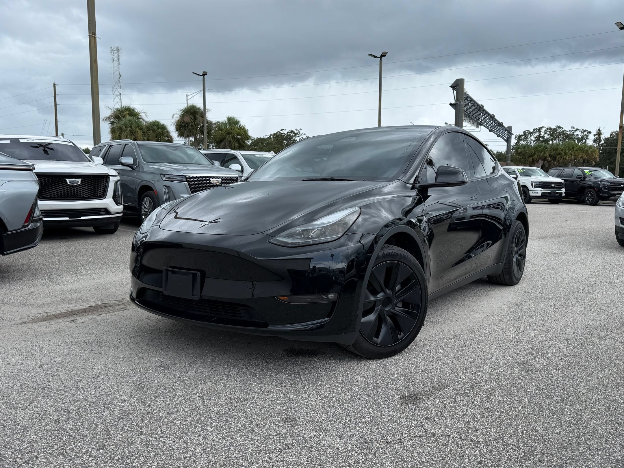 Used 2025 Tesla Model Y Long Range with VIN 7SAYGDEE7SF247582 for sale in Fairburn, GA