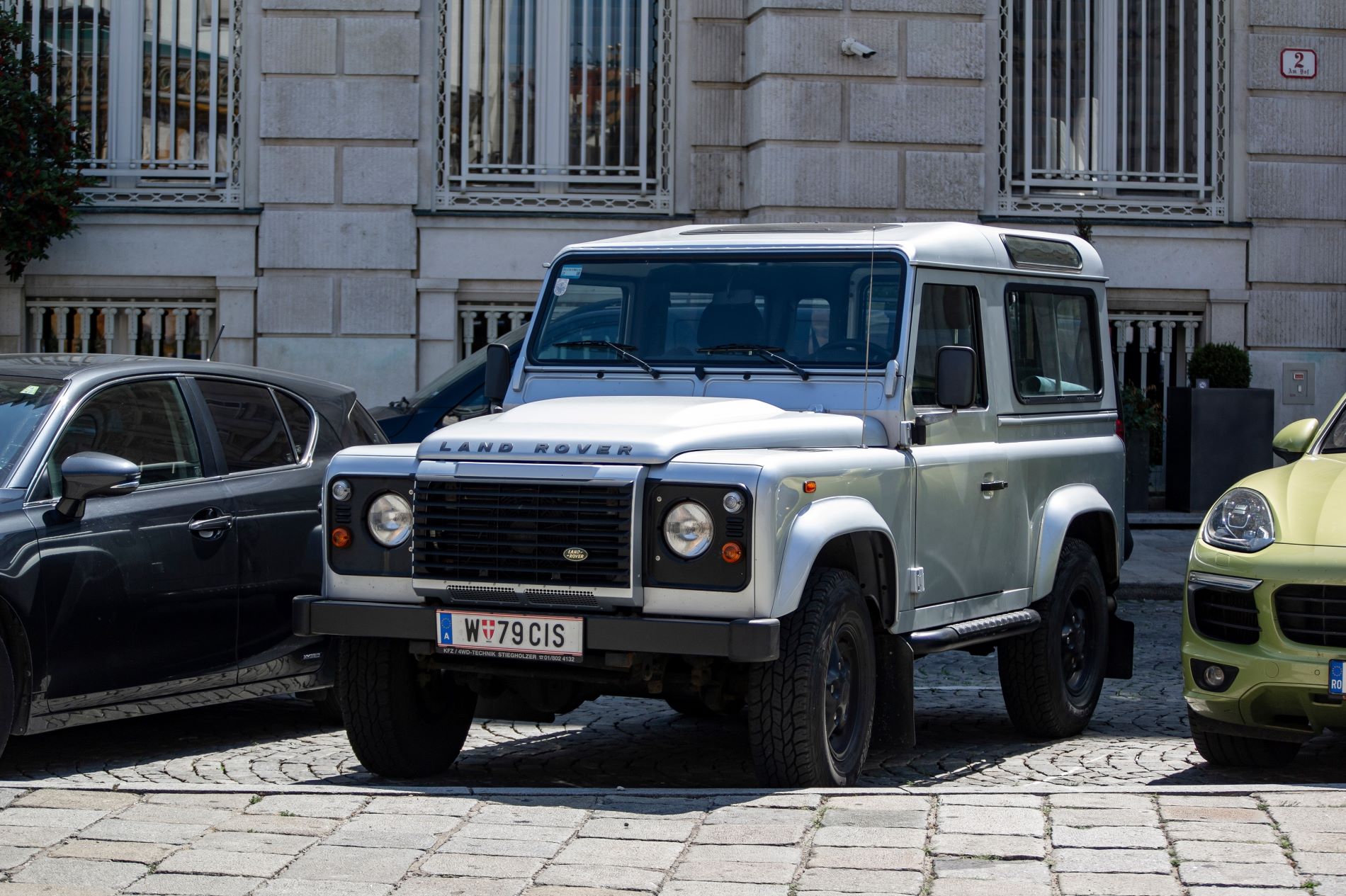 Exterior of Land Rover Series III with four doors and alloy wheels