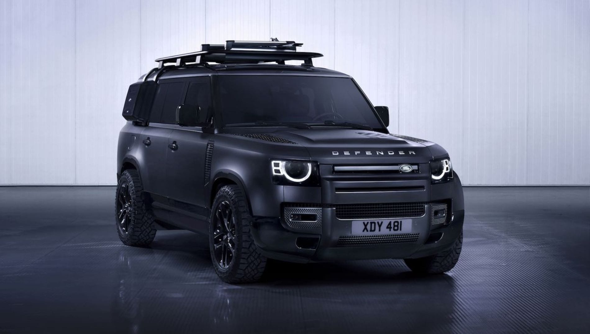 Exterior of Land Rover Defender with four doors and alloy wheels