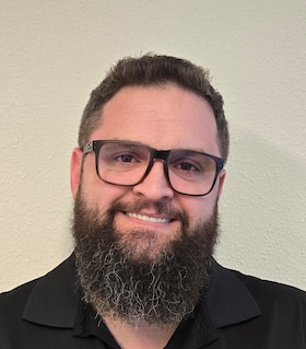 Staff member Jeremy Carlton  from ID_357a2e