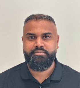 Staff member Shak Ali from ID_65e2e6cdac69