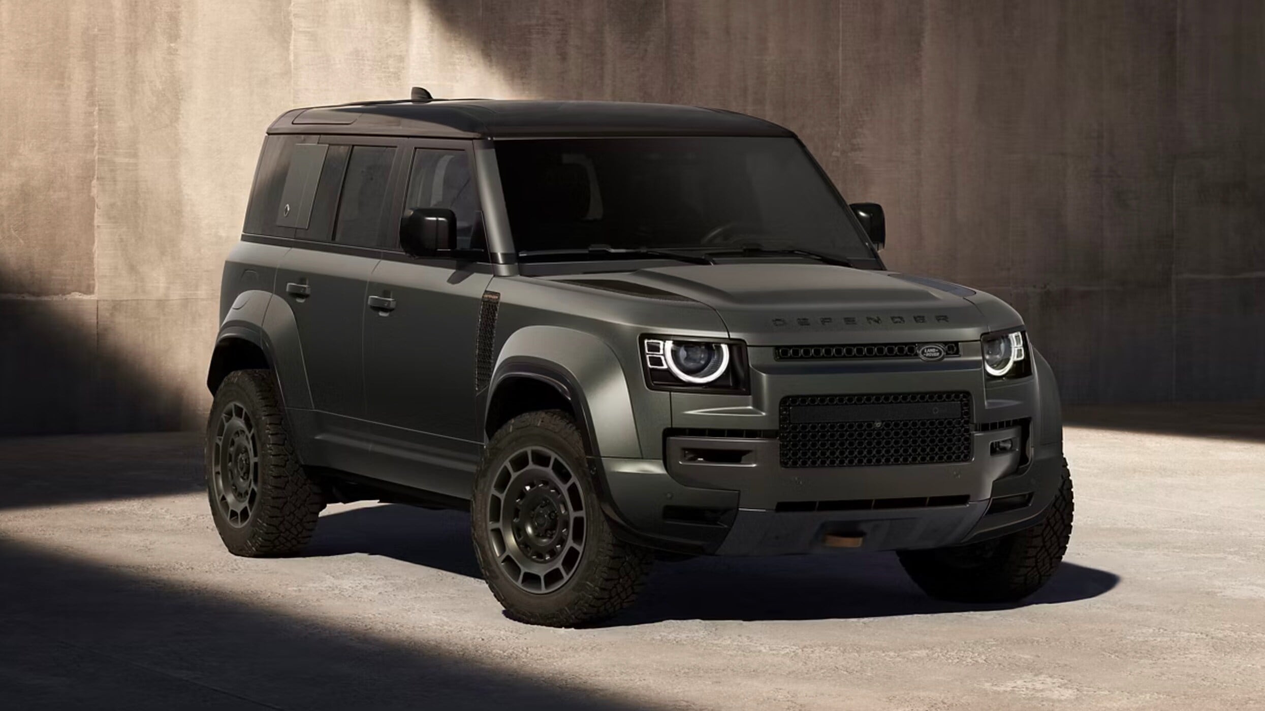  Person cheerfully signing documents.