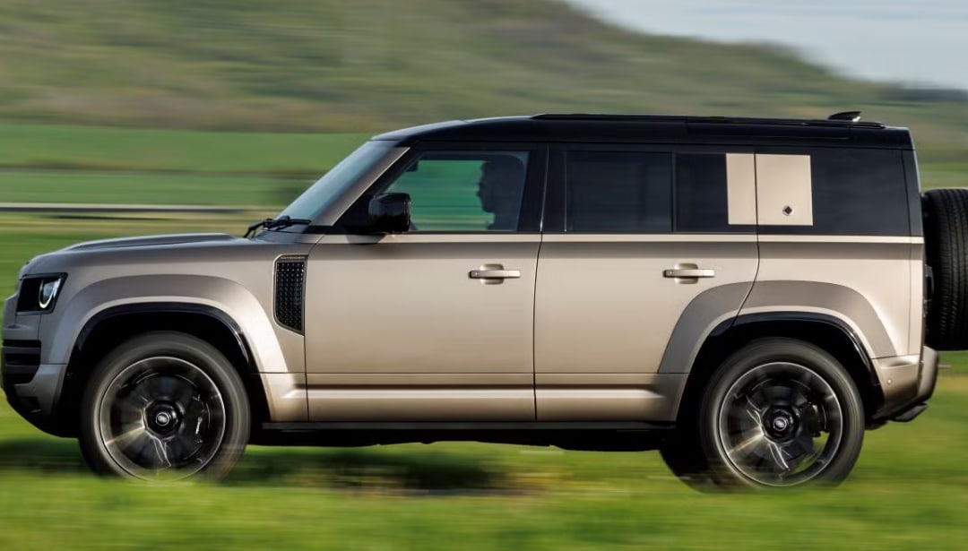 LR%20SUV%20driving%20through%20a%20grassy%20field.png