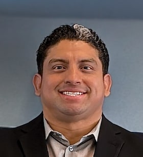 Staff member Jimmy Cruz from ID_43b047161f60