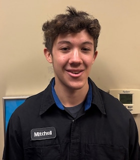 Staff member Mitchell from ID_194fbe8f9647