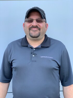 Staff member Chris Dash from f52940fd12ae