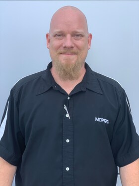 Staff member Tom Giles from f52940fd12ae