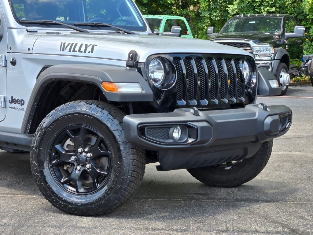 Used 2022 Jeep Wrangler Unlimited Willys Sport with VIN 1C4HJXDGXNW141601 for sale in Laporte, IN