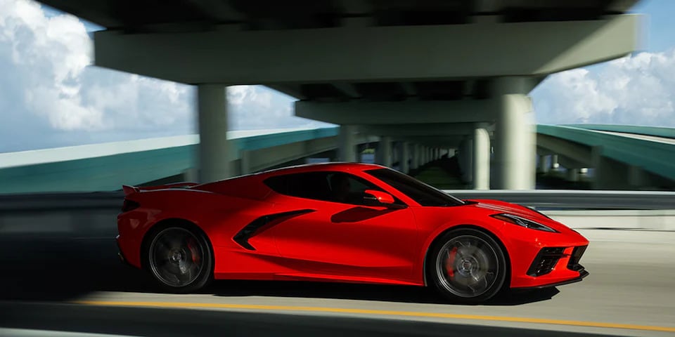 2022 Corvette driving under a bridge