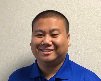 Staff member Jessie Vang from ID_415338bad5c8