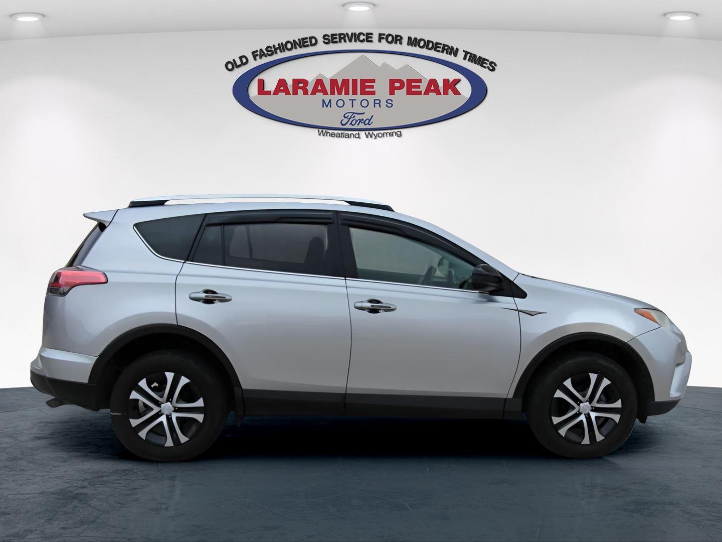 Used 2016 Toyota RAV4 LE with VIN 2T3BFREV6GW421713 for sale in Wheatland, WY