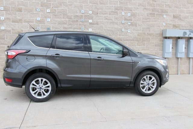Used 2017 Ford Escape SE with VIN 1FMCU9G99HUC99028 for sale in Wheatland, WY