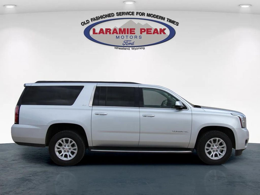 Used 2015 GMC Yukon XL SLT with VIN 1GKS2HKCXFR695380 for sale in Wheatland, WY