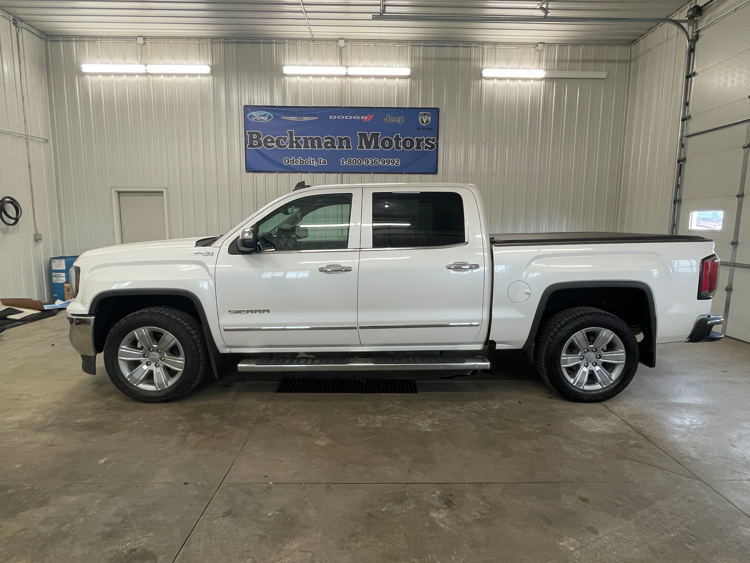 Used 2018 GMC Sierra 1500 SLT with VIN 3GTU2NEC7JG265359 for sale in Odebolt, IA