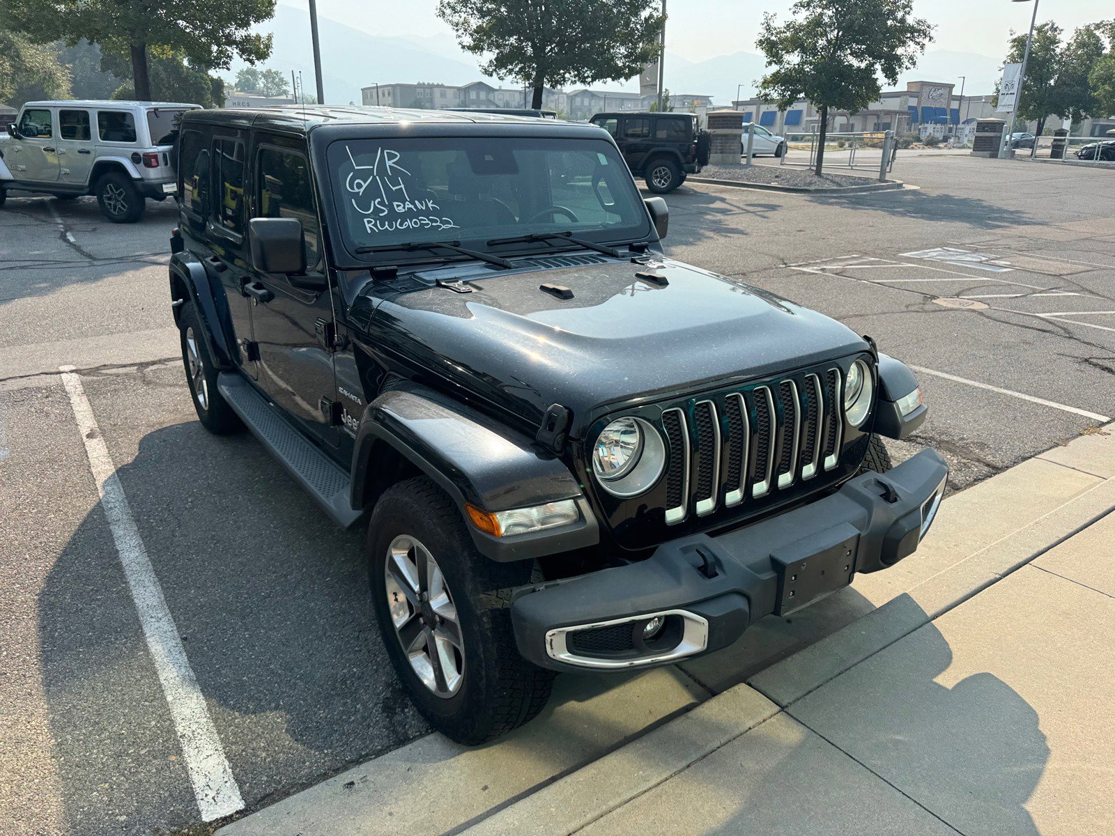 Used 2019 Jeep Wrangler Unlimited Sahara with VIN 1C4HJXEG7KW610332 for sale in Bountiful, UT