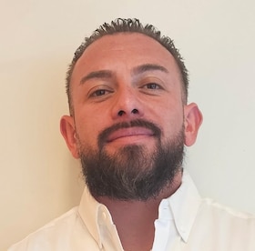 Staff member Joseph Costales from ID_f63502353f13