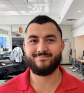 Staff member Cristian Llanos from ID_5710fab46a4e