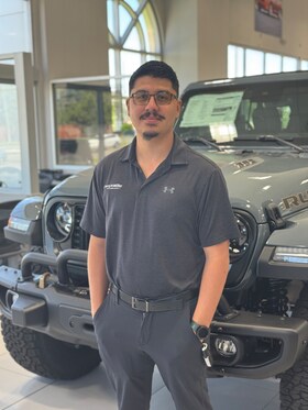 Staff member Eric Irunguay from ID_9b5cb1950b6a