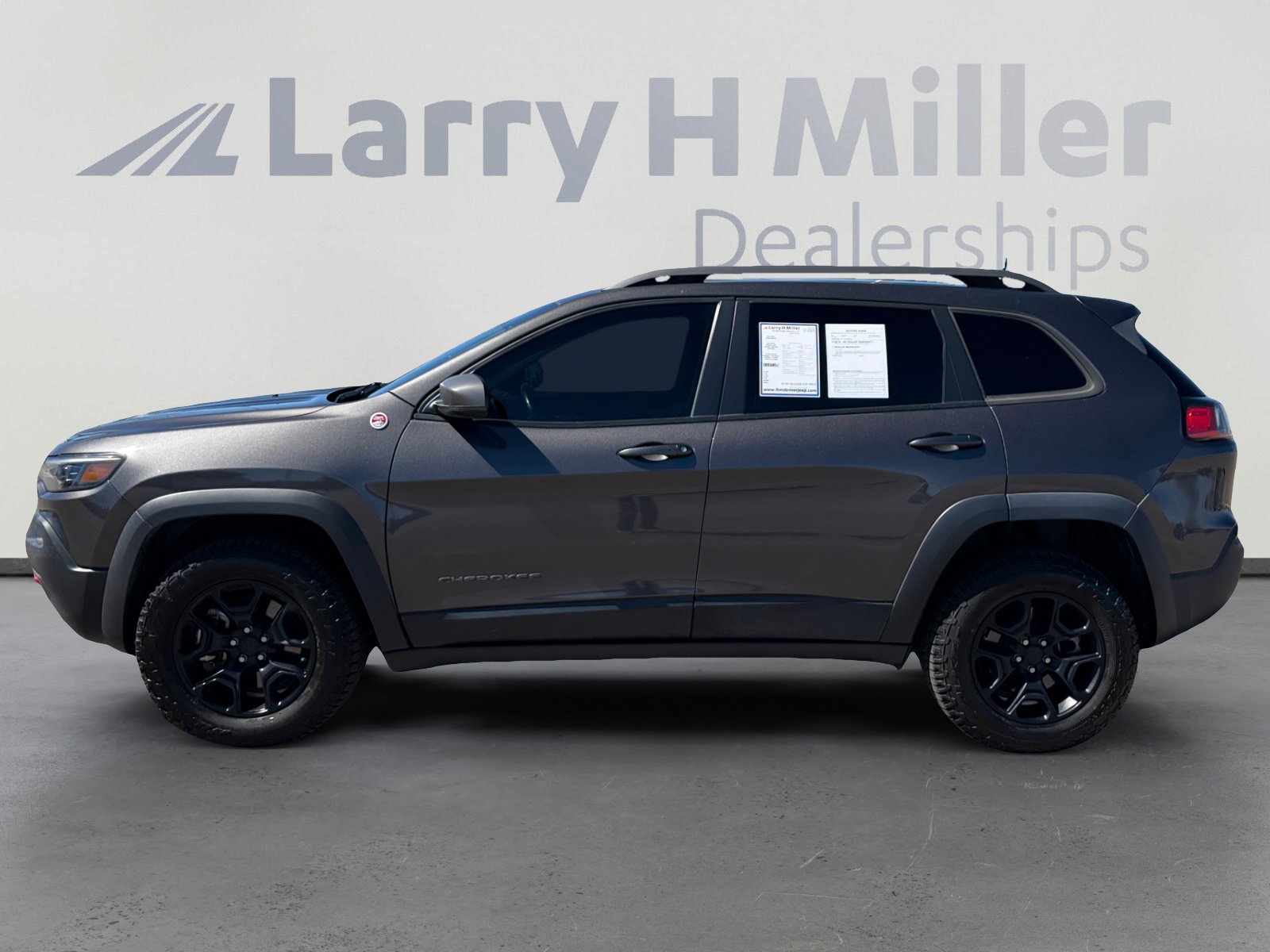 Used 2015 Jeep Cherokee Sport with VIN 1C4PJLAB0FW683997 for sale in Denver, CO