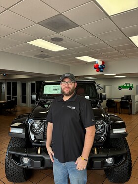 Staff member Justin Clock from ID_a77a65aa5abd