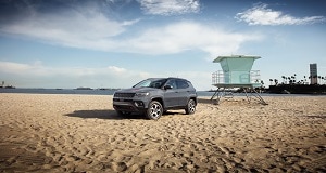 Jeep Compass driving on beach