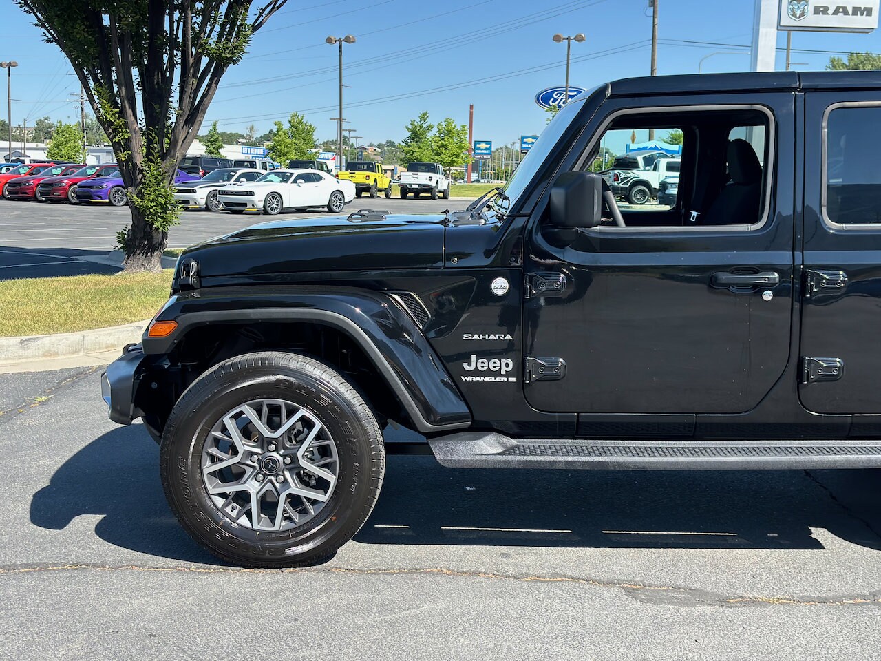 Used 2024 Jeep Wrangler 4-Door Sahara with VIN 1C4PJXEN5RW129242 for sale in Provo, UT