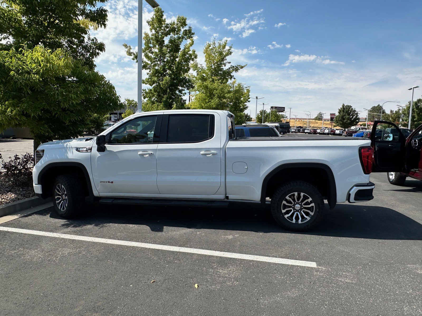 Used 2023 GMC Sierra 1500 AT4 with VIN 1GTUUEE89PZ153127 for sale in Riverdale, UT