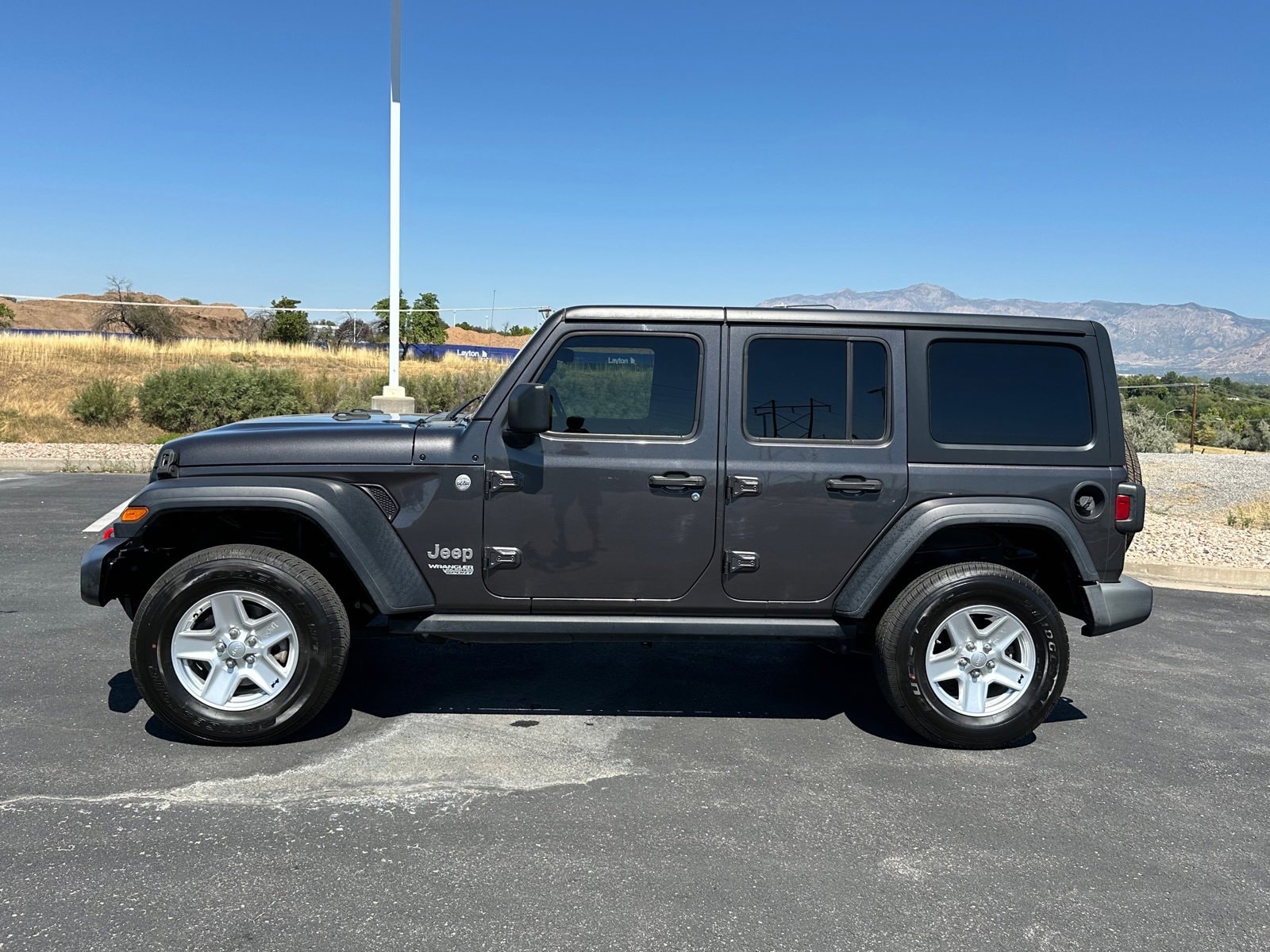 Used 2020 Jeep Wrangler Unlimited Sport S with VIN 1C4HJXDG3LW221657 for sale in Riverdale, UT