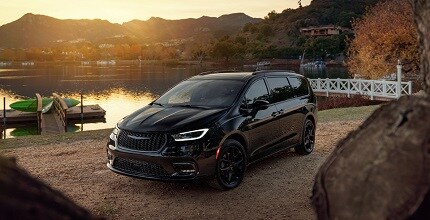 chrysler pacifica near a lake