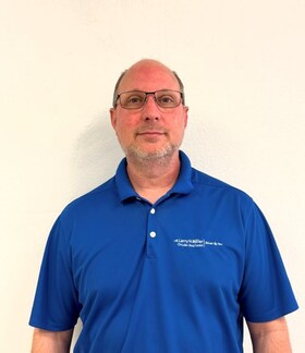 Staff member Travis Bila from ID_8cdb8b