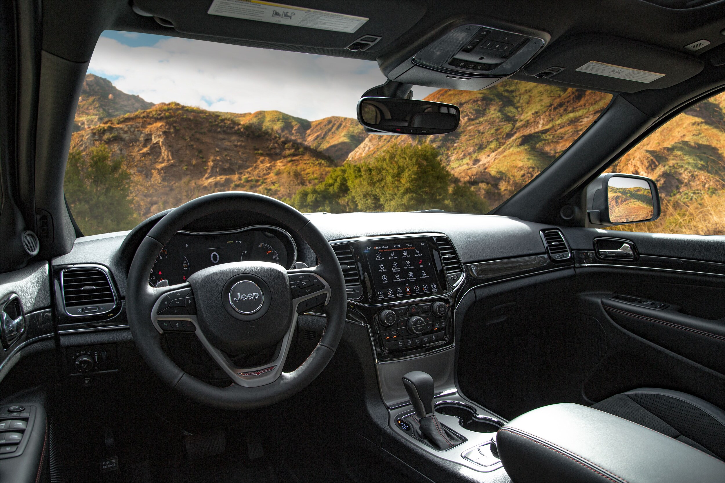 Jeep Grand Cherokee L interior interior shot of the Jeep Grand Cherokee L showing front windshield and dashboard