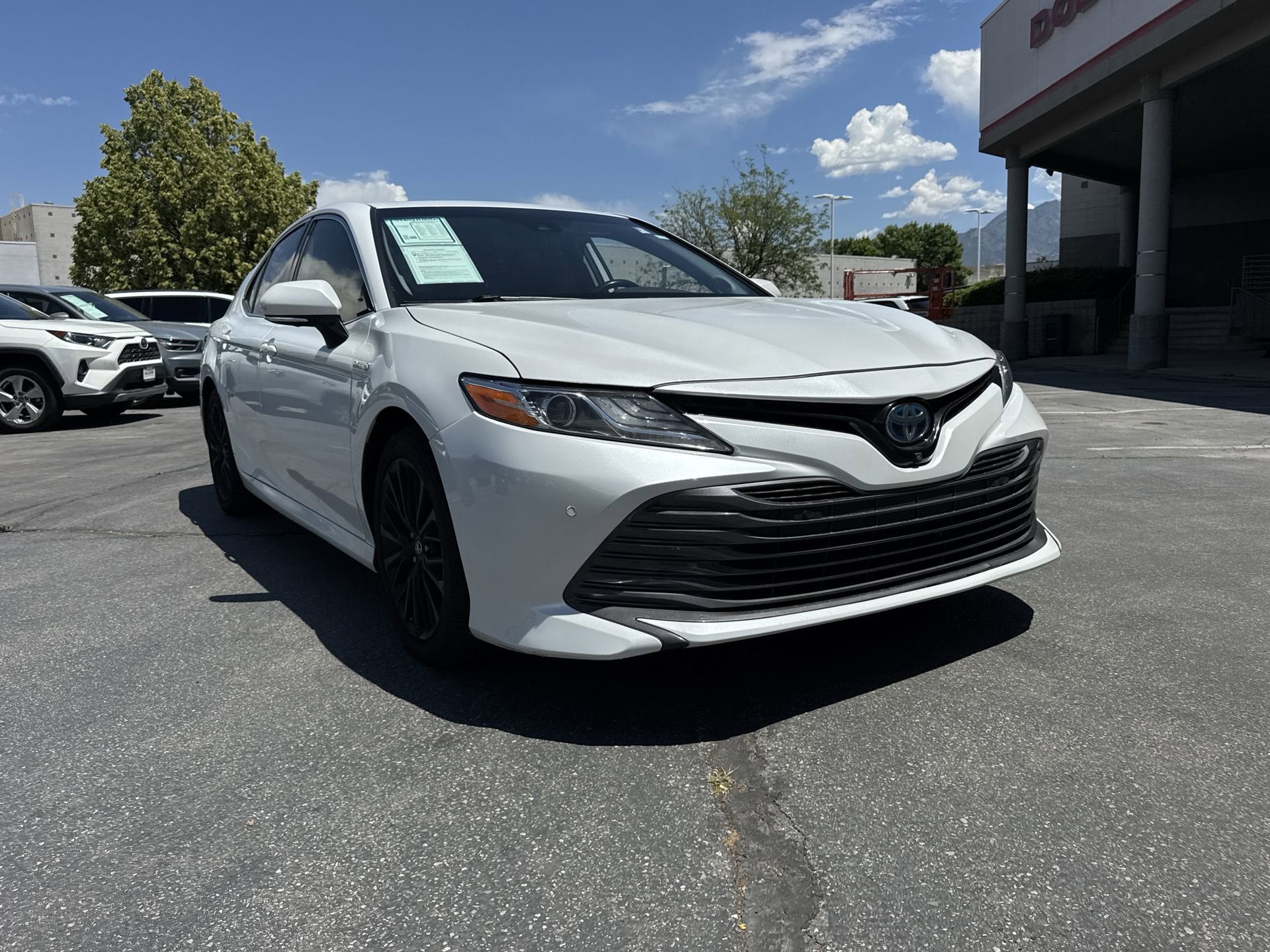 Used 2019 Toyota Camry XLE Hybrid with VIN 4T1B21HK7KU521142 for sale in Sandy, UT
