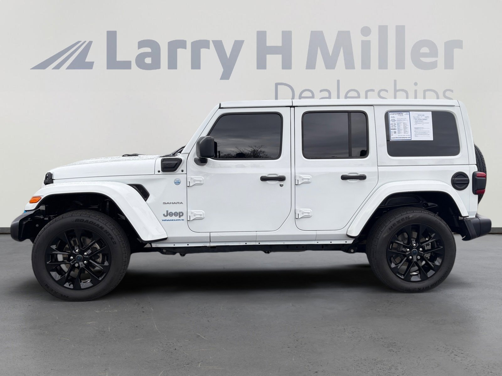Used 2024 Jeep Wrangler 4xe Sahara 4XE with VIN 1C4RJXP6XRW192268 for sale in Aurora, CO