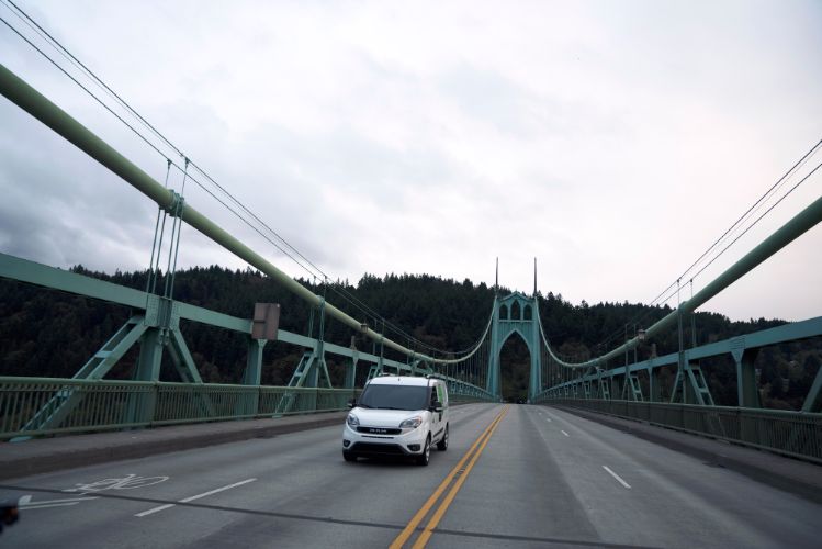 Ram ProMaster driving over a bridge