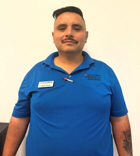 Staff member Adolfo Reyes from ID_9d767f