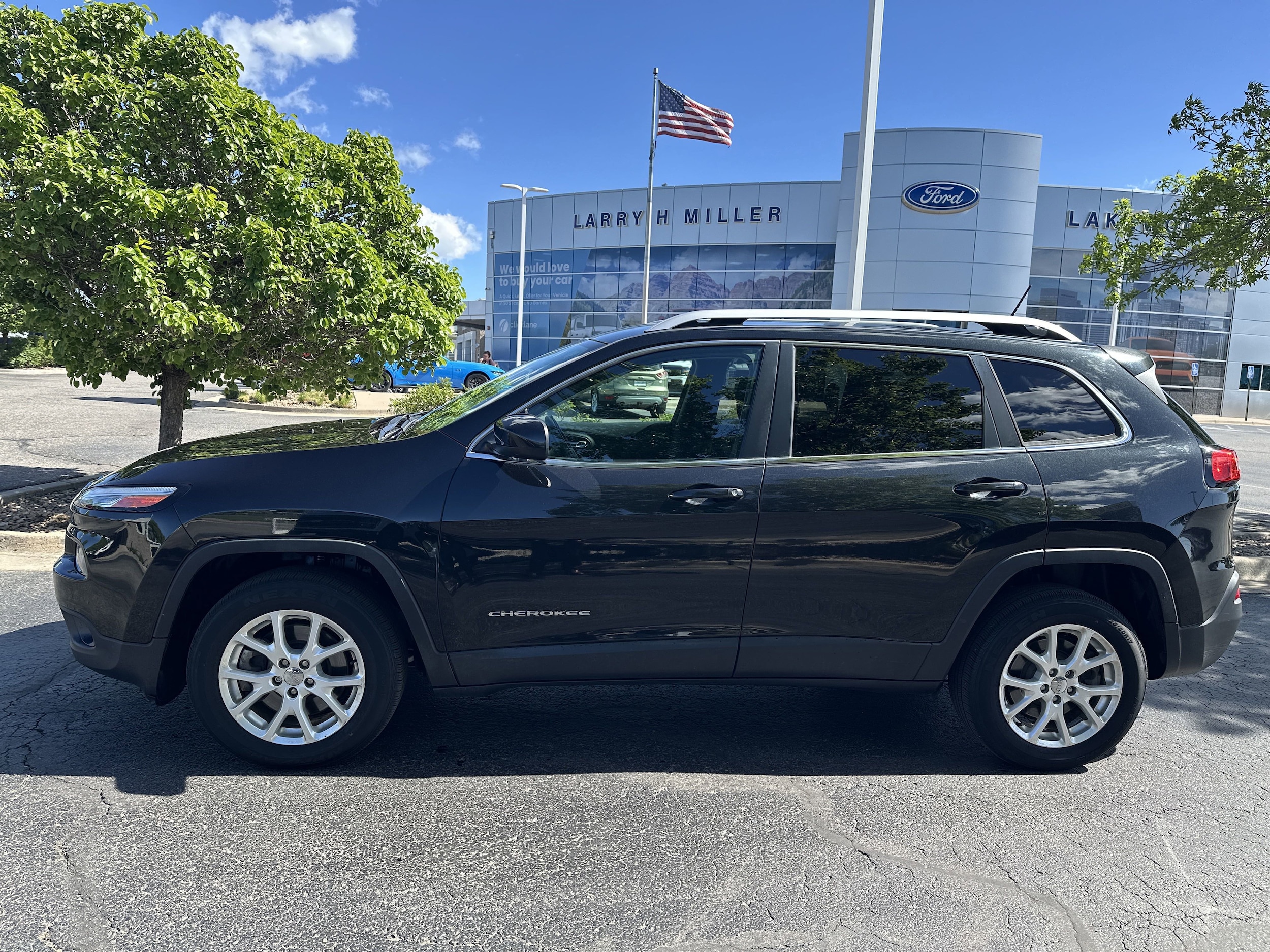 Used 2015 Jeep Cherokee Latitude with VIN 1C4PJMCS7FW659649 for sale in Lakewood, CO