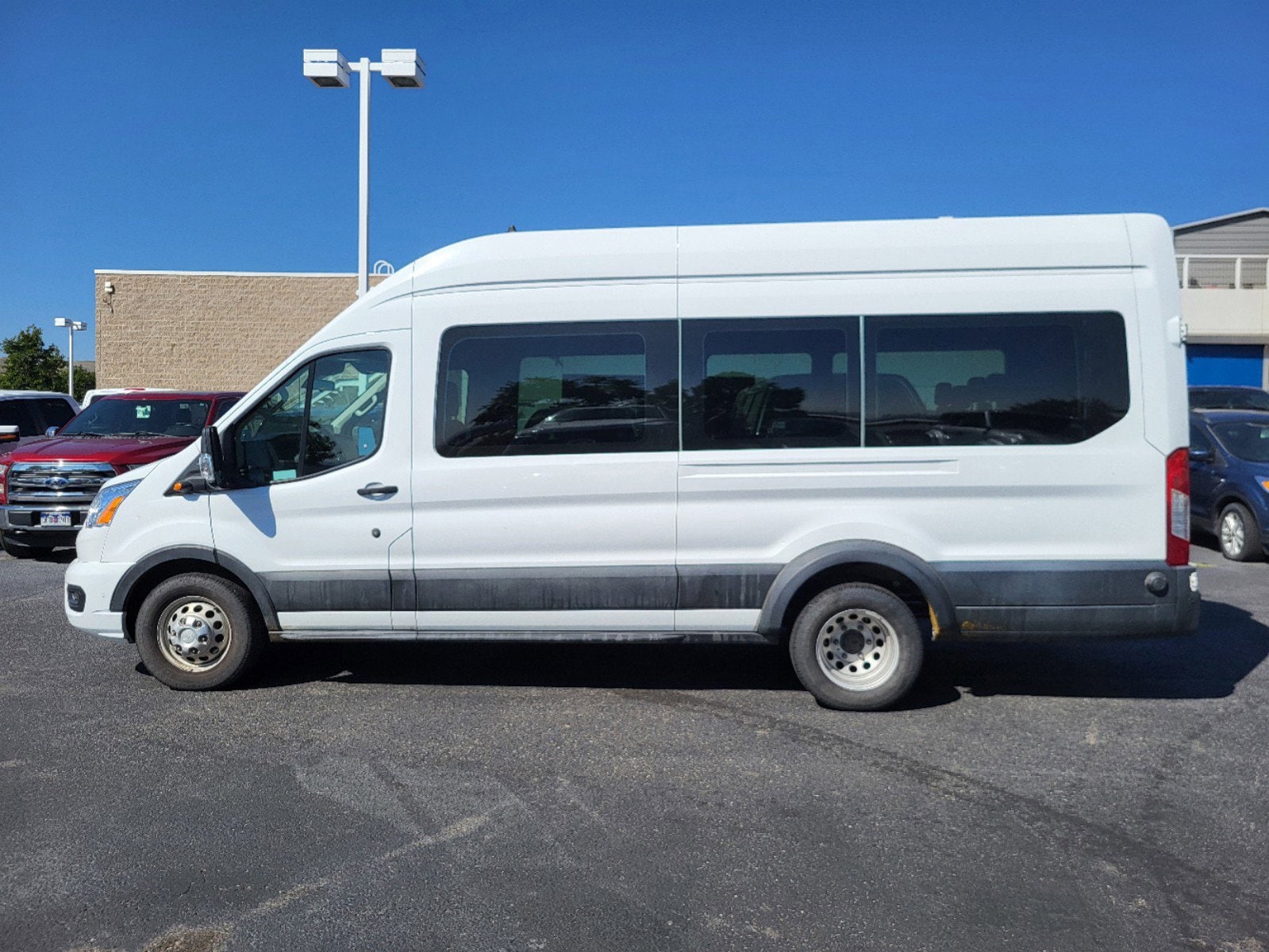 Certified 2021 Ford Transit Passenger Van XLT with VIN 1FBVU5XG3MKA98885 for sale in Lakewood, CO