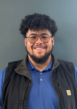 Staff member Elijah Green from ID_21f54811a54e