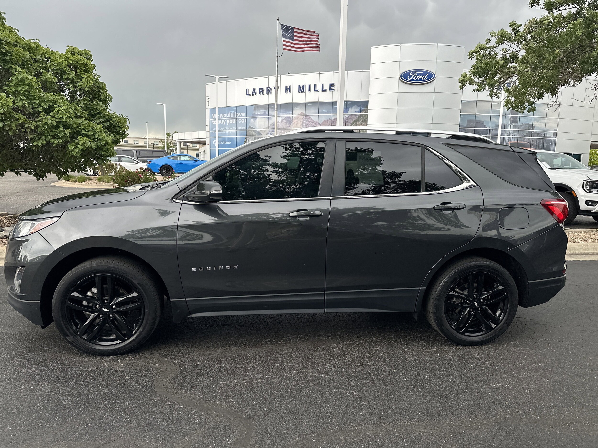 Used 2021 Chevrolet Equinox LT with VIN 2GNAXUEV9M6123831 for sale in Lakewood, CO