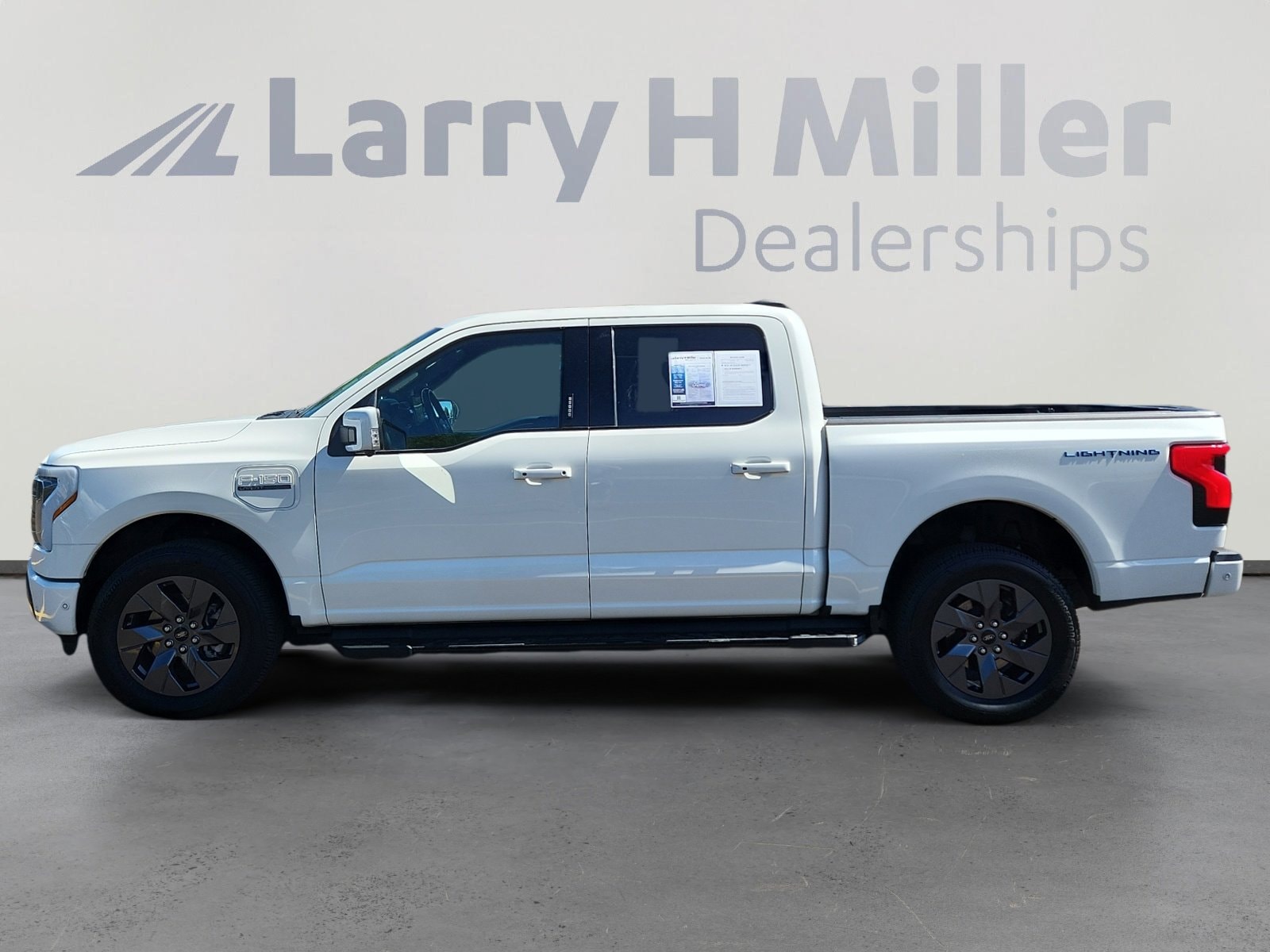 Used 2022 Ford F-150 Lightning Lariat with VIN 1FTVW1EL5NWG16388 for sale in Lakewood, CO