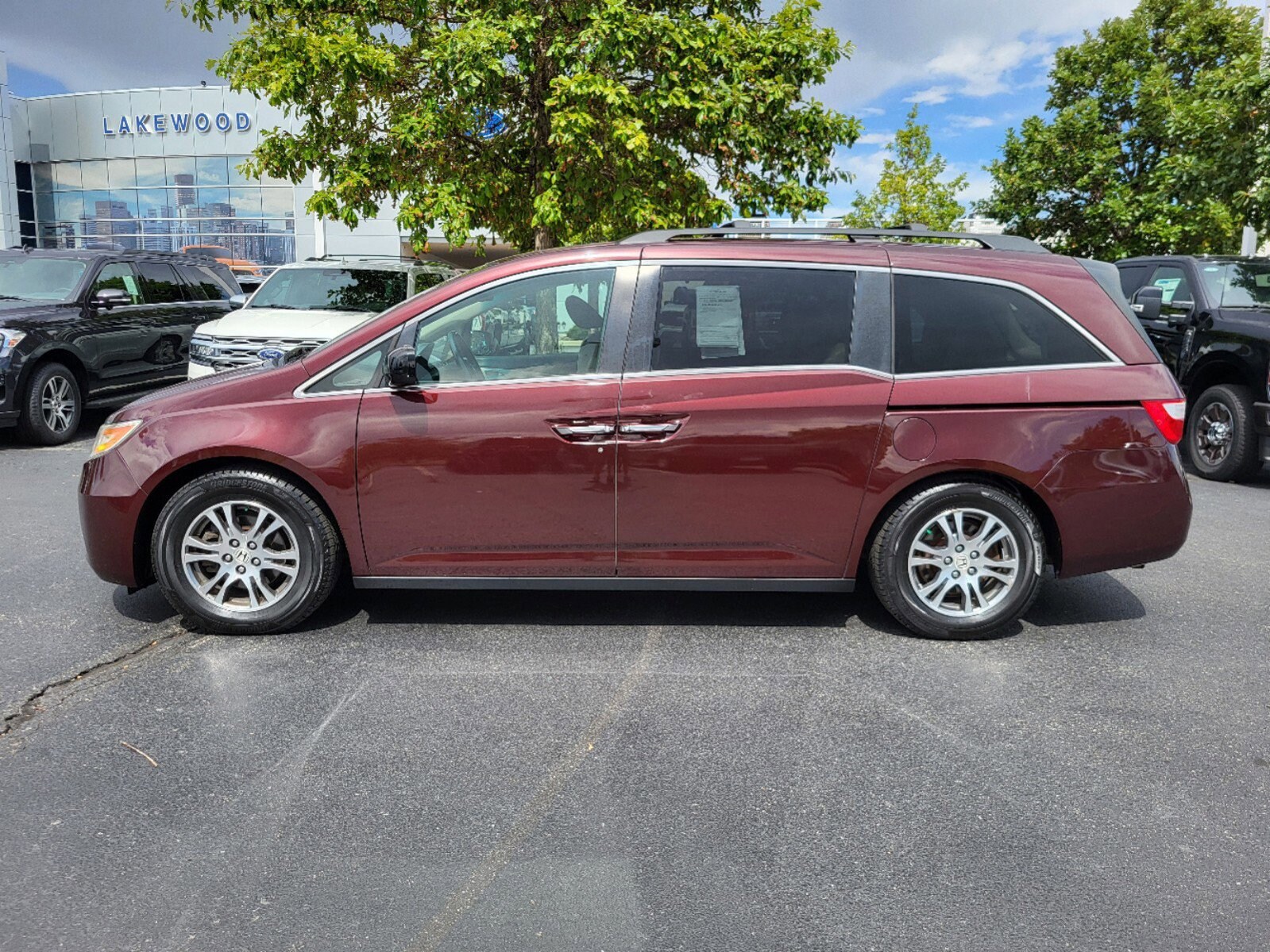 Used 2012 Honda Odyssey EX-L with VIN 5FNRL5H68CB138802 for sale in Lakewood, CO