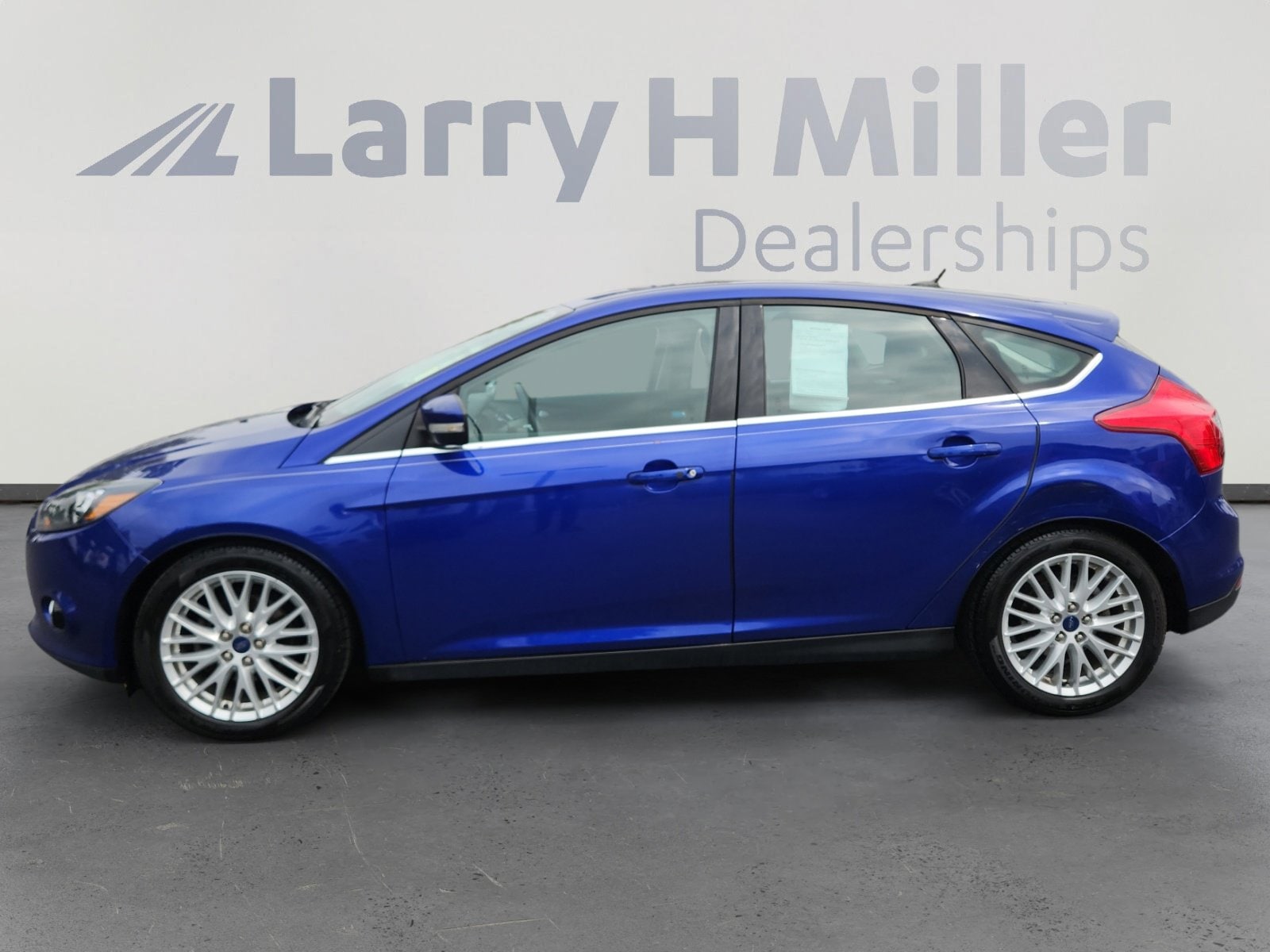 Used 2014 Ford Focus Titanium with VIN 1FADP3N22EL366014 for sale in Lakewood, CO