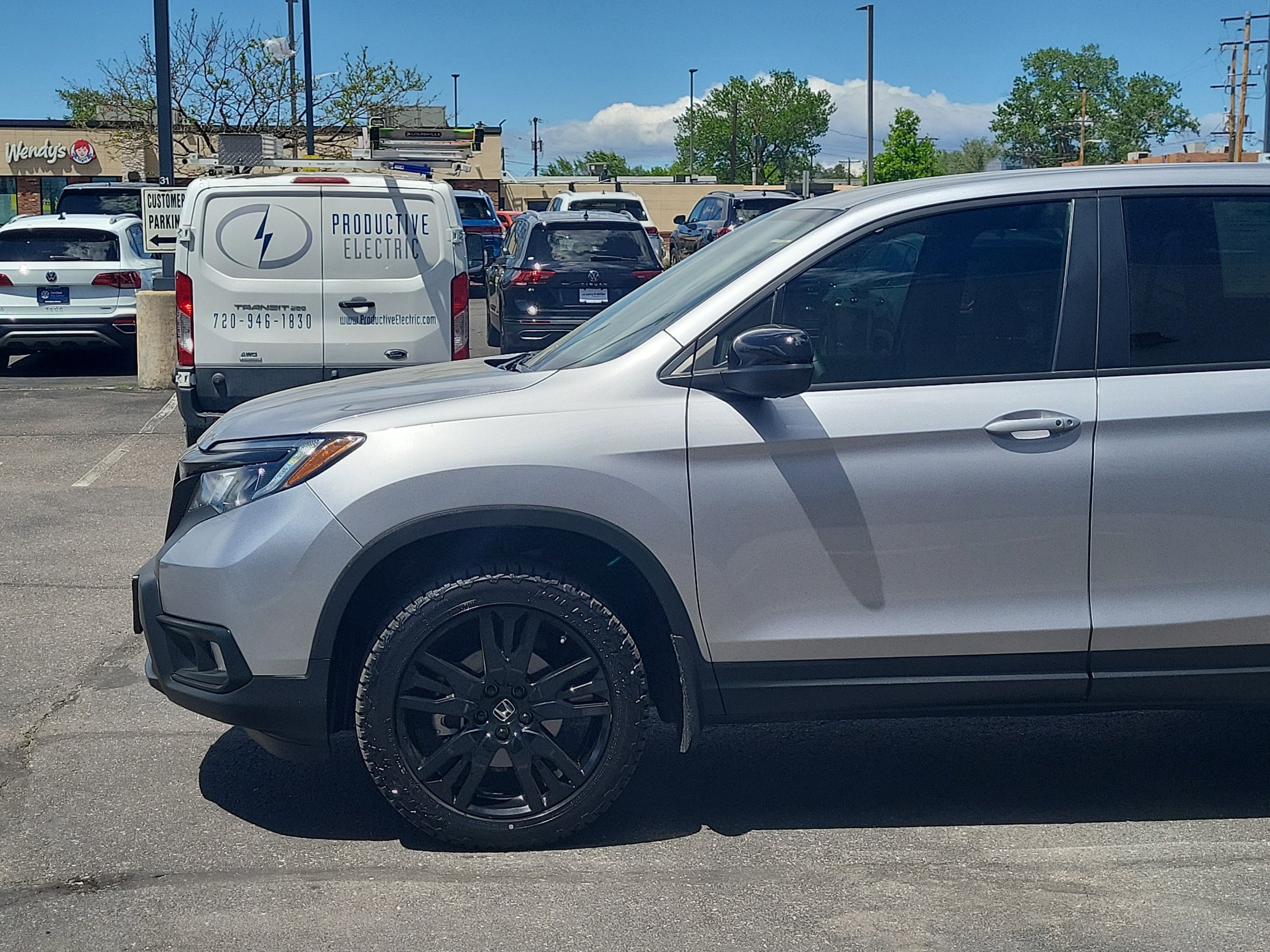 Used 2021 Honda Passport Sport with VIN 5FNYF8H23MB026301 for sale in Lakewood, CO