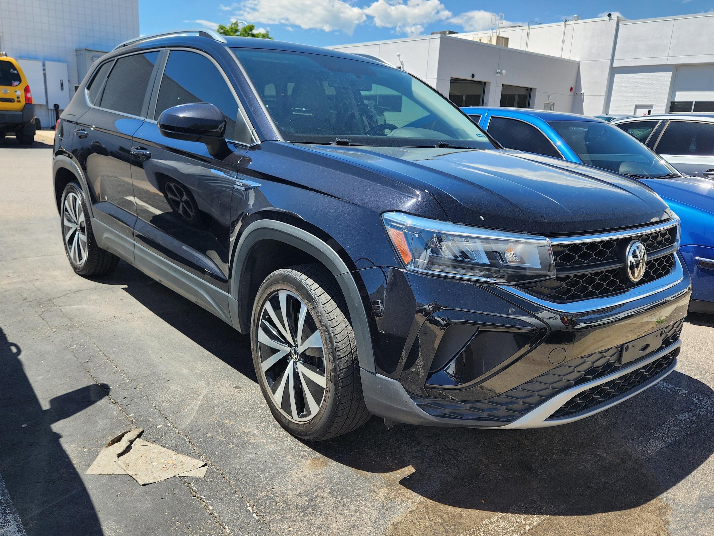 Used 2022 Volkswagen Taos SE with VIN 3VVRX7B22NM059017 for sale in Lakewood, CO