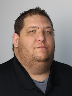 Staff member Joseph Longo from ID_9a2e254e4494