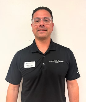 Staff member Manny Diaz from ID_99af47bb93cb