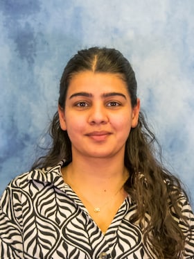Staff member Nimrat Kaur from 4e1c1b56eb03