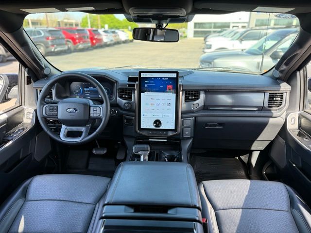 Used 2025 Ford F-150 Lightning Lariat with VIN 1FT6W5L72SWG06057 for sale in Fenton, MI