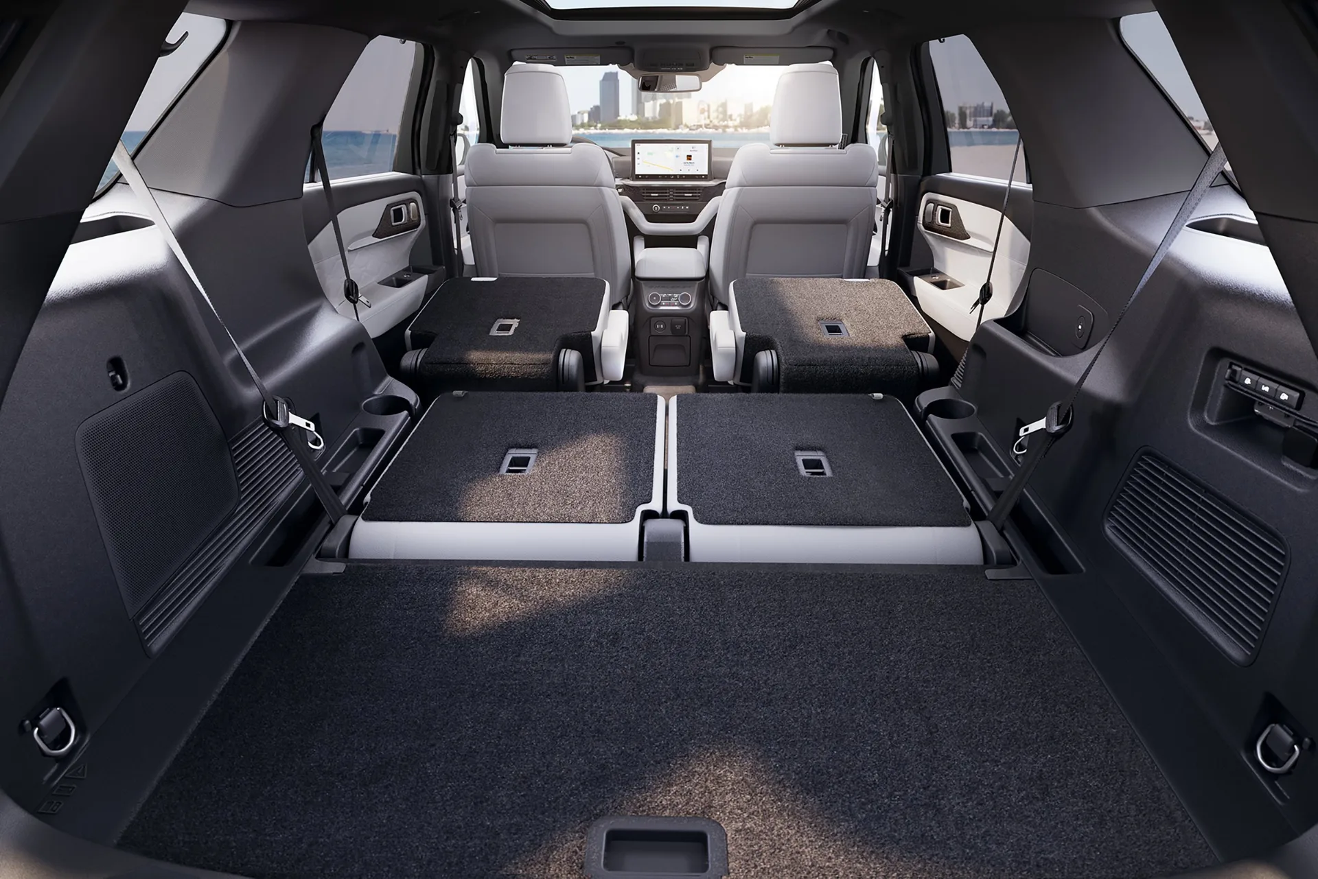2027 Ford Explorer cargo area with second and third rows folded at Lasco Ford Fenton Michigan